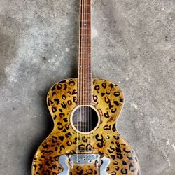 A Vintage Washburn Accoustic Guitar Signed by Slash and Takahiro Matsumoto