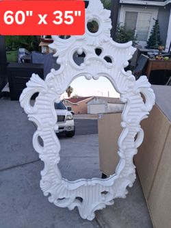 Beautiful elegant white mirror