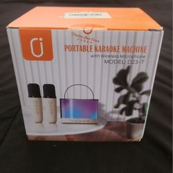 Portable Karaoke Speaker With A Wireless Microphone 