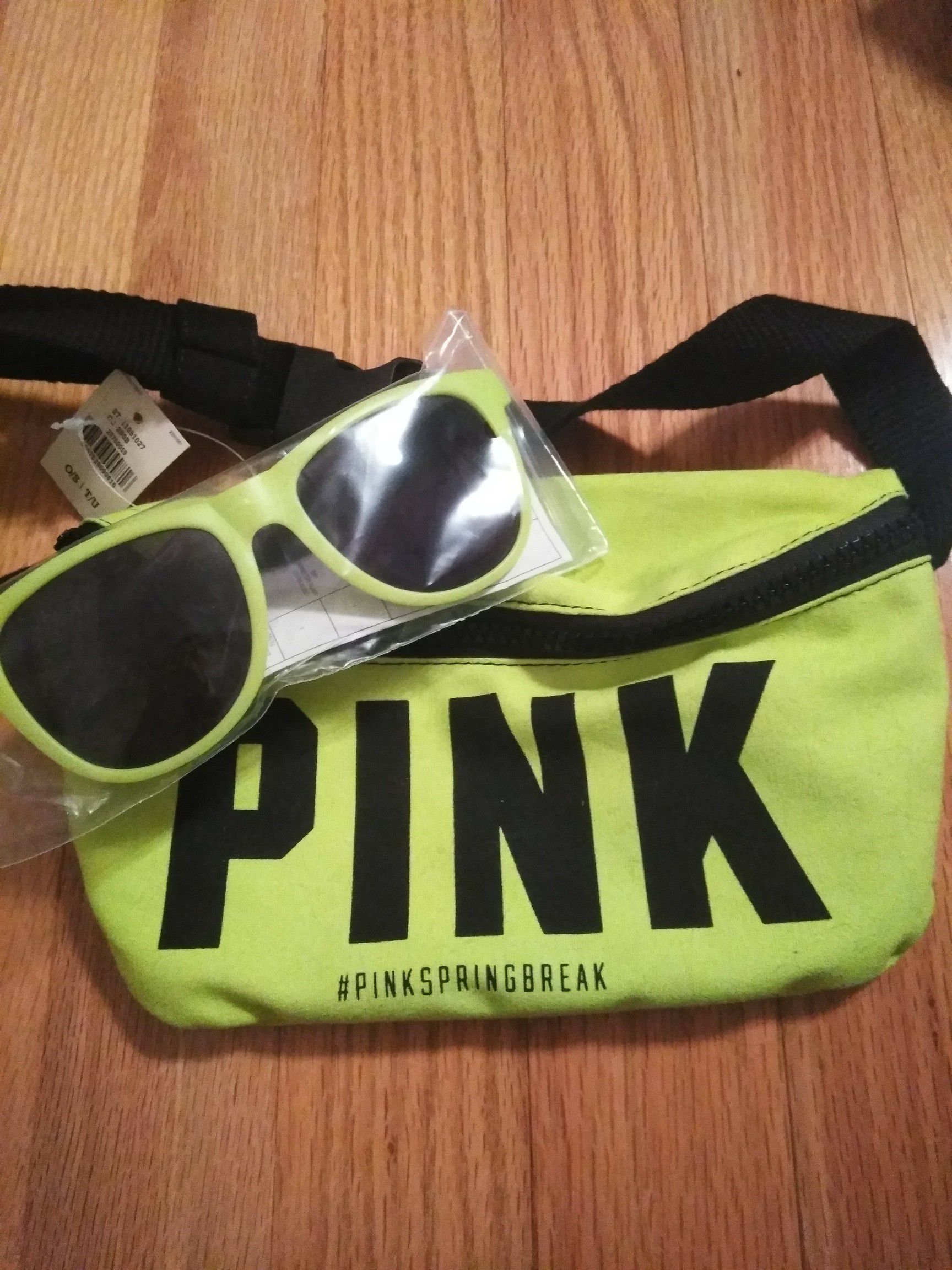 Victoria secret pink sunglasses and a bag