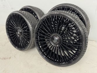 NEW 28 inch gloss black tis wheels with floating caps wrapped in lexani 295/25r28 tires