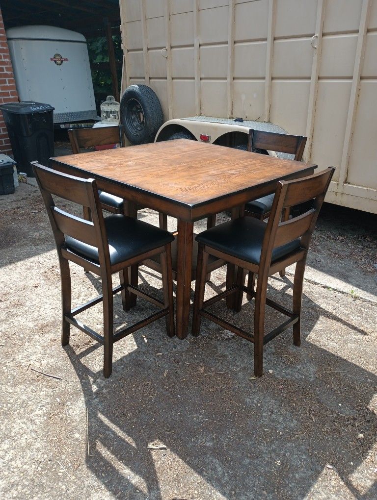 Dining Table With Four Chairs.