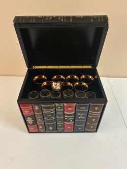 vintage-style wooden box with crystal with crystal glasses with a distinct gold rim accent