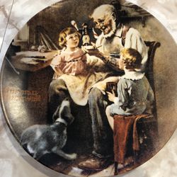 Rockwell society heritage collection plates one through 11. Plate number two “the cobbler” missing.