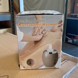 Massage oil warmer