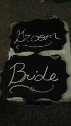 Bride and groom signs