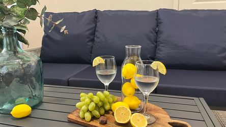 Outdoor Sofa with Navy Blue Cushions