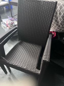 4 brown outdoor chairs