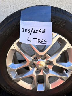 4 tires With Rims 400.00 Firm Please. Chevy
