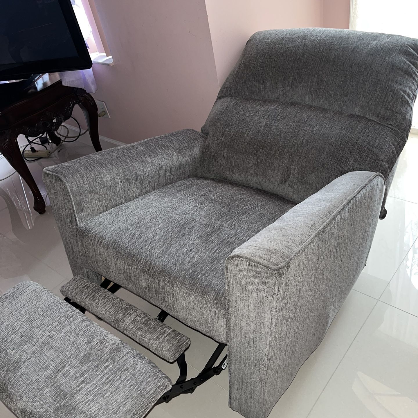 Grey reclining chair