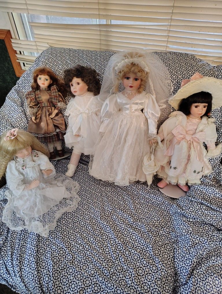 A Bunch Of Porcelain Dolls