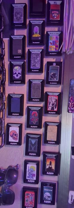 Brand new zippos in boxes still