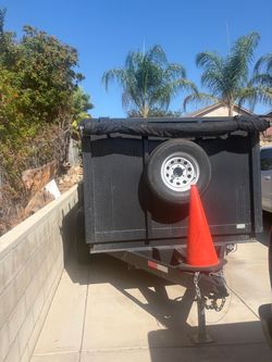 Black Dump Trailer with Spare Tire