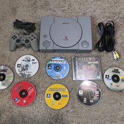 Playstation one with 8 games