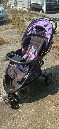 Baby Trend Purple Three-Wheel Stroller