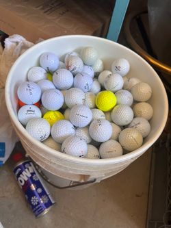 2 buckets of golf balls