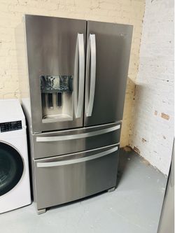 Whirlpool stainless steel refrigerator (36" x 69" x 28") with a receipt for a 90-day warranty.
