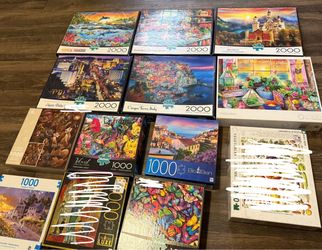 11 bundle set of Puzzles (1000-2000 pieces)