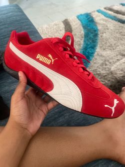 Puma , red and white size 10