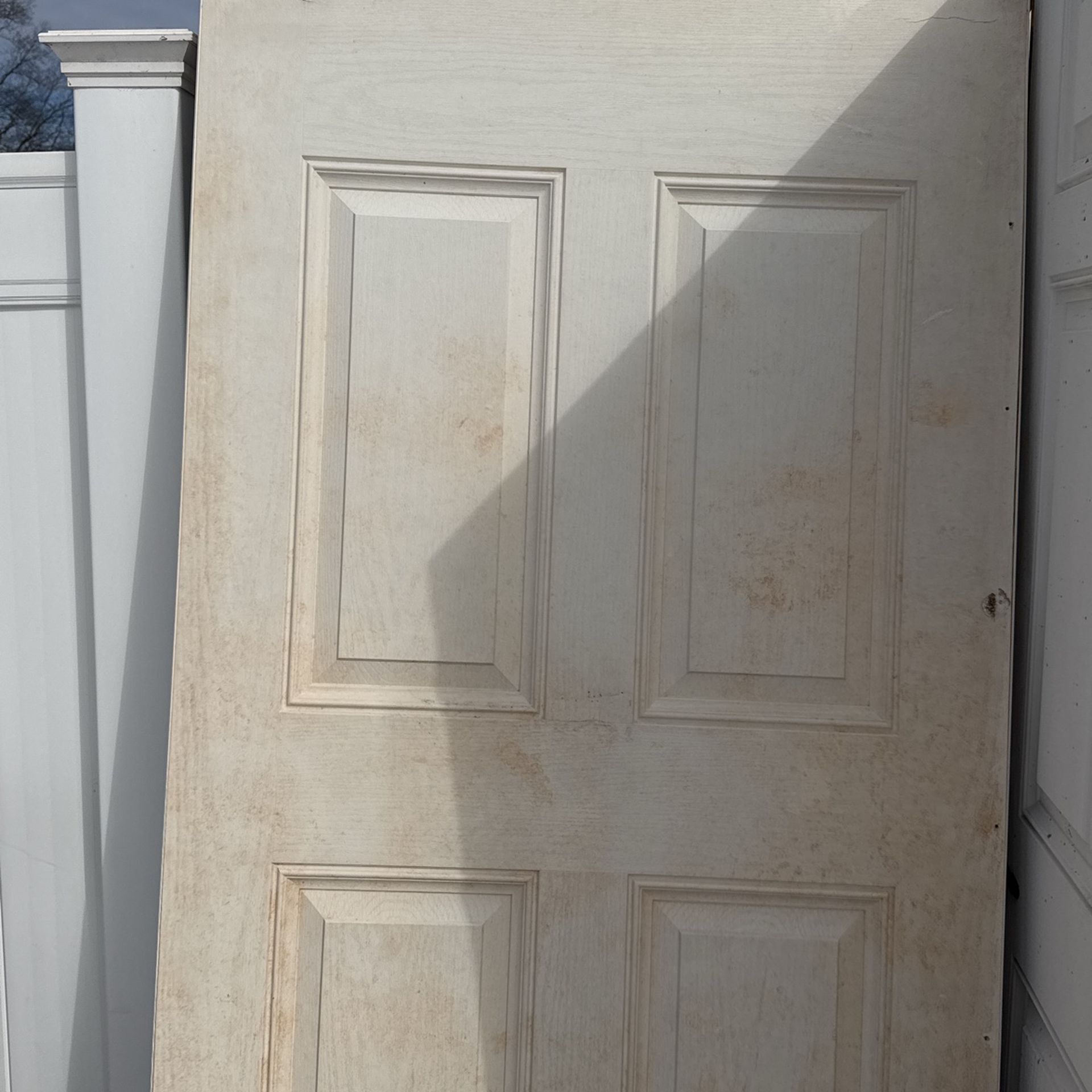White Slab Vinyl Door