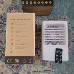 2 Brand NEW Plug In Fans with Water Evap Ability