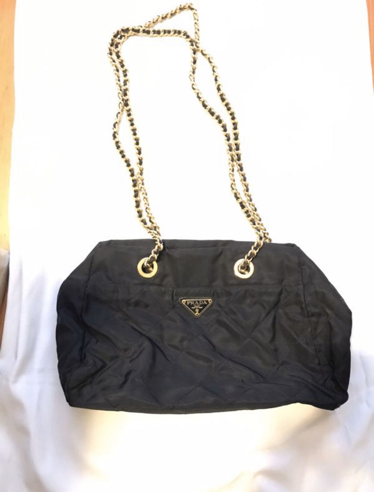 Prada bag with Gold/leather chains