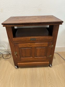 White Clad swivel top TV stand with pull out drawer