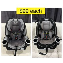 Graco 4EVER car seat, convertible, recliner, all ages, double facing $99 each/ Silla bebe a niño, reclinable a cama, carro $99 cada una