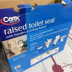 Carex Raised Toilet Seat with Handles & Locking Feature 