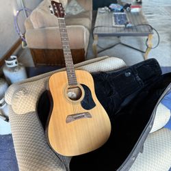 Acoustic steel string guitar. 