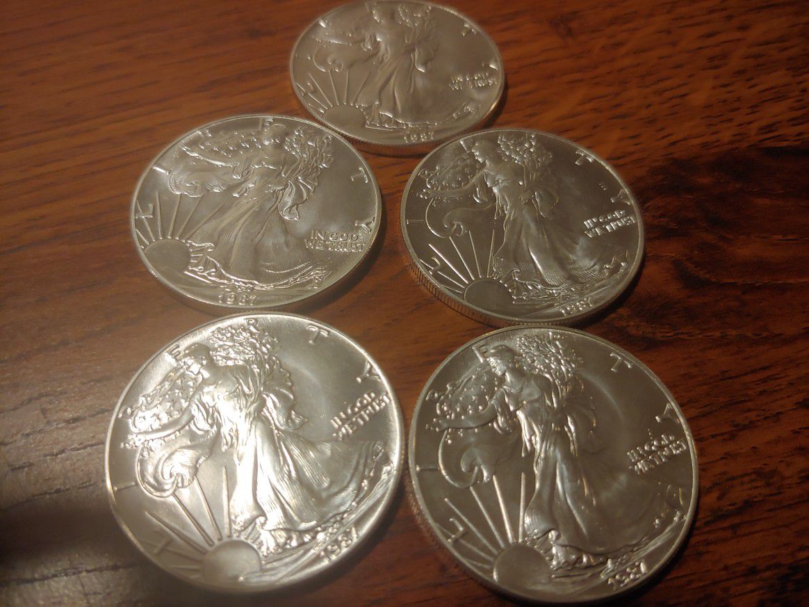 Five 5 1987 American Eagles one troy ounce each