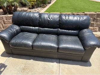 Couch leather with fold out bed
