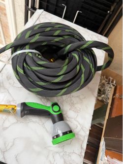 New 100 ft water hose non expandable