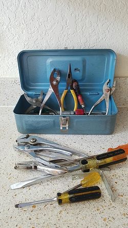 Small blue metal tool box with tools