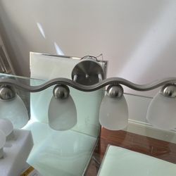 Bank Of Overhead Bathroom Lights 