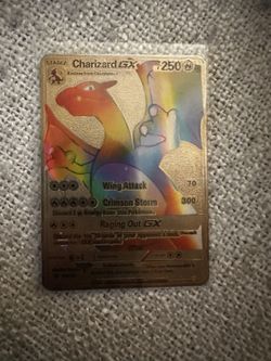 Pokémon card (Gold rainbow charzard GX)