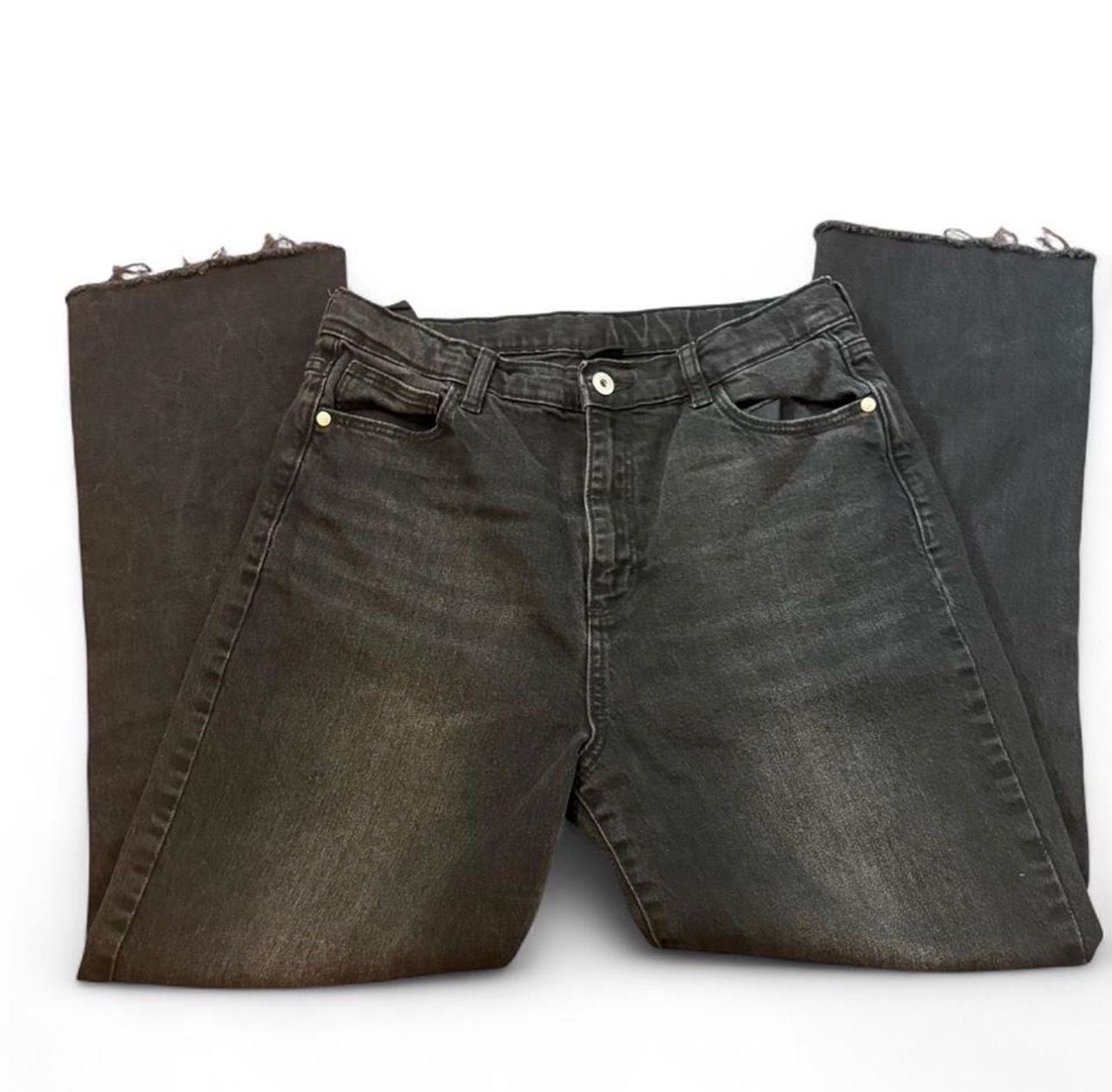 Black straight leg jeans with frayed hem