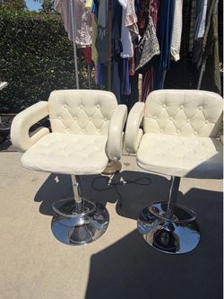 2 White leather barstools $50