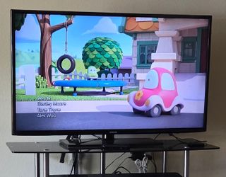 Samsung Smart LED TV + TV stand + Roku