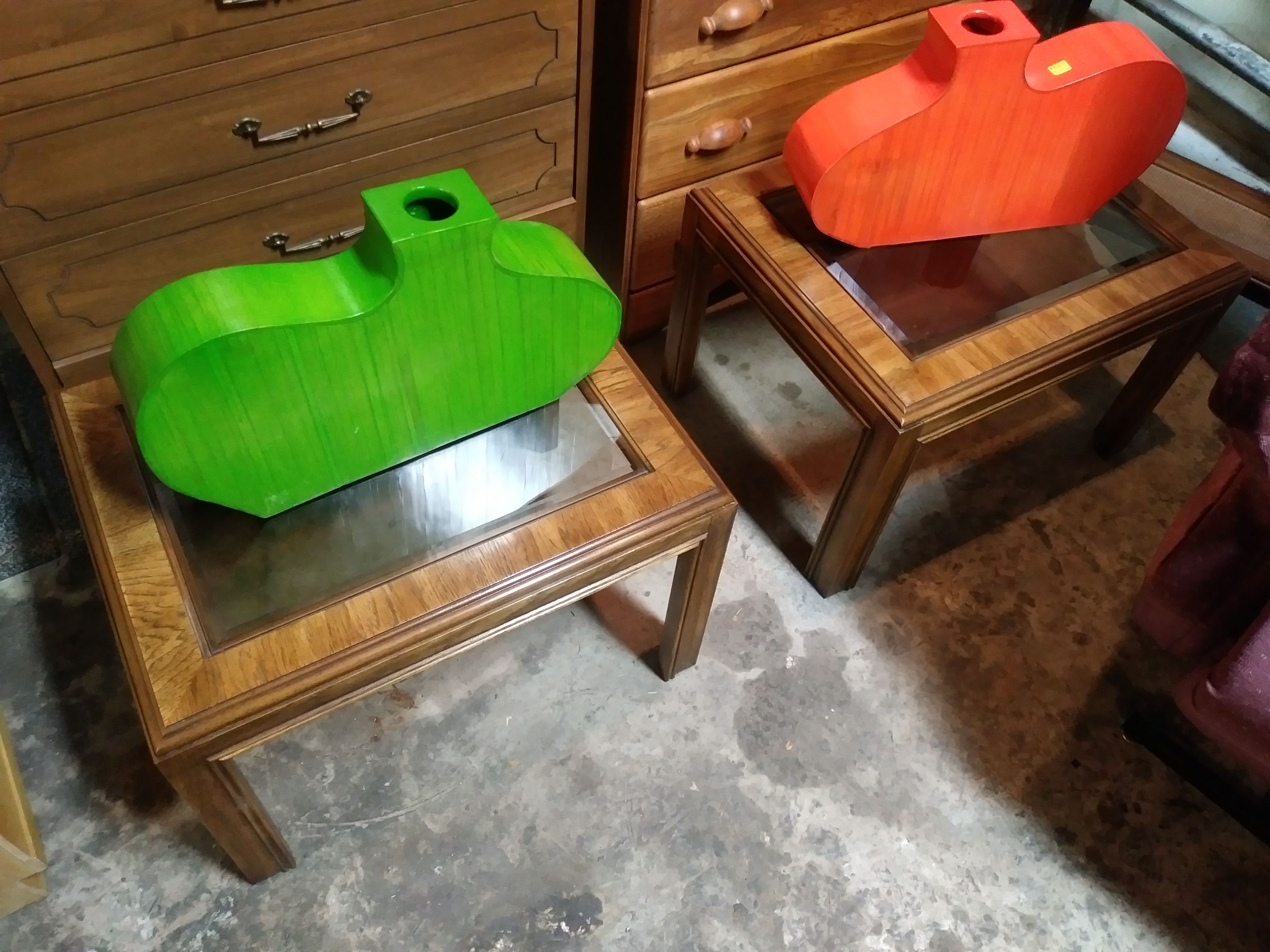 Pair of matching bevelled glass top end tables for sale