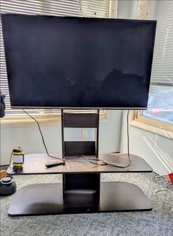 50 inch LG smart T.V. with stand