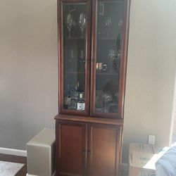 Bombay  company cherry wood cabinet