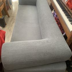 3 piece couch . It is a soft couch that makes into a bed