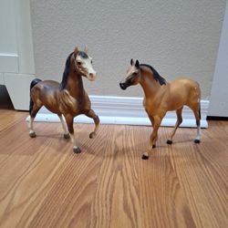 2 Toy Horses