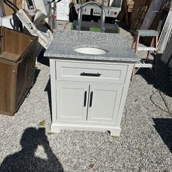 Hi everyone we have this nice vanity the original top get crack but we put one better one  gray granite strong.  Top cost $300 cabinet lake $200 total