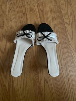 Black white ruffled bow heels