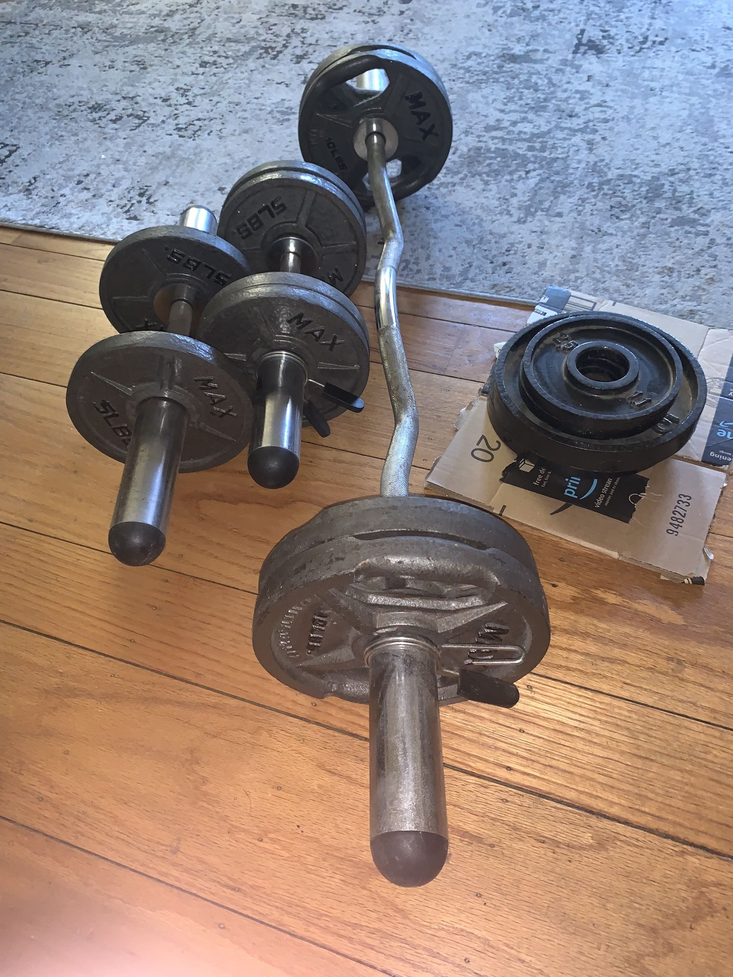 265 Lb Olympic Weight Set With Dumbbells And EZ Curl Bar