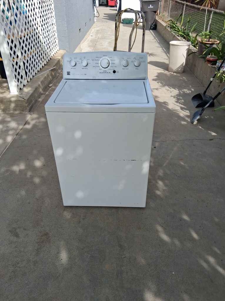 Kenmore Washing Machine Working condition with brand new suspension roll  it's nothing wrong