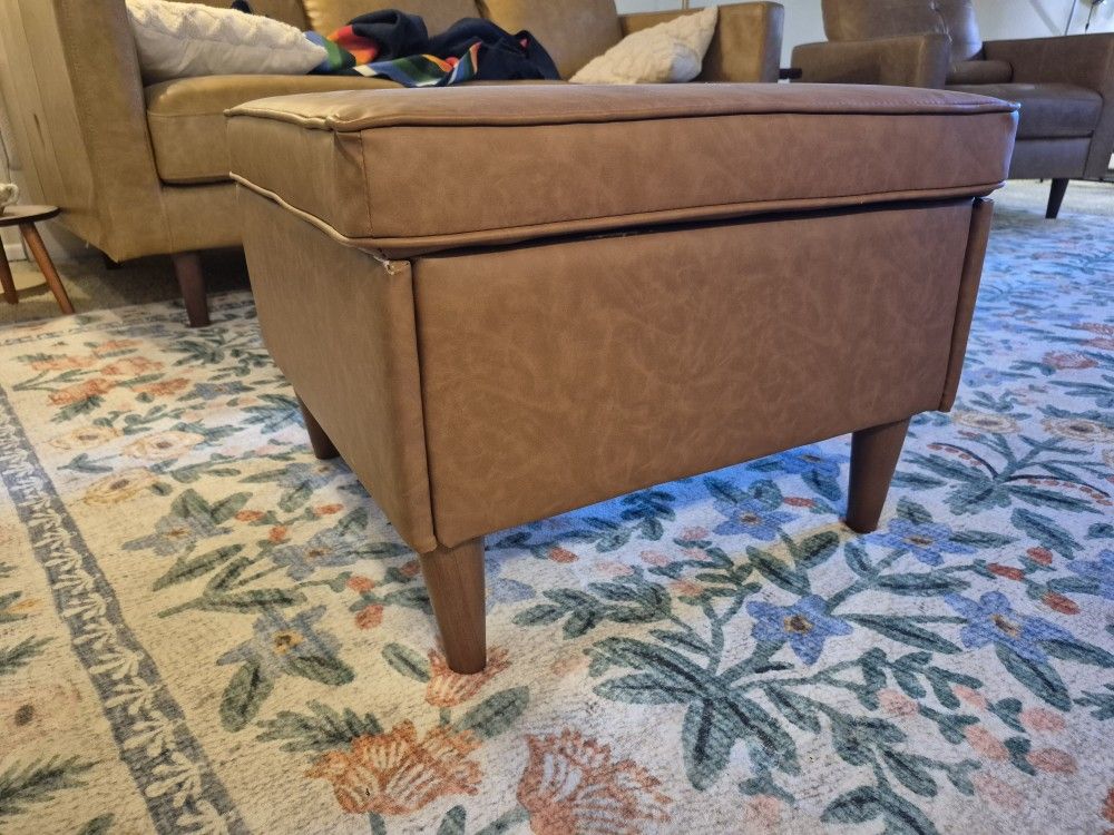 Faux leather storage ottoman