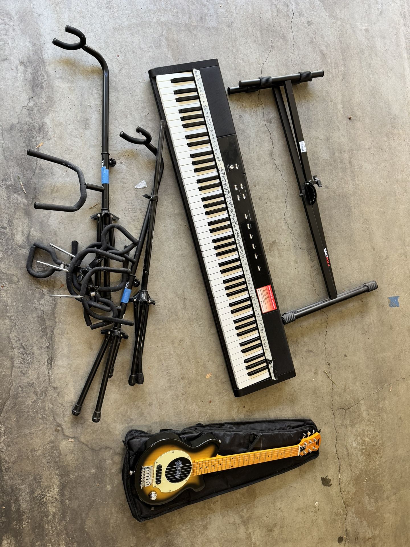 Music Gear. Keyboard. Guitar Stands. Travel Guitar